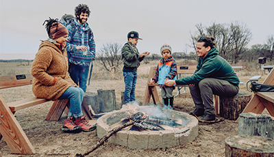 People gathered around a fire